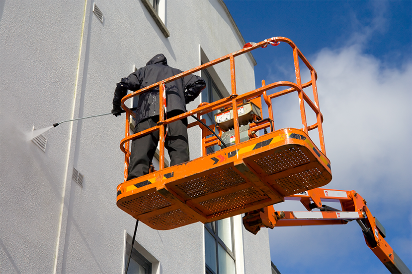 Building exterior washing boom lift Bay Area commercial
